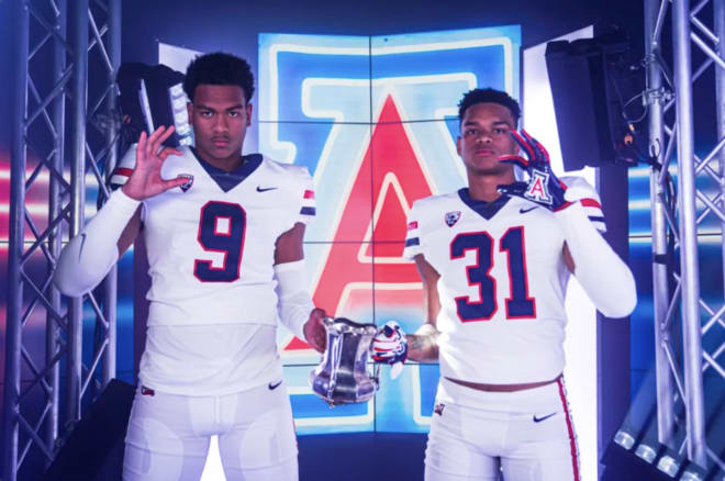 Elijah Rushing (left) poses with his brother, Cruz, who is currently a safety for the Wildcats after transferring back home to Arizona after beginning his career at Florida.