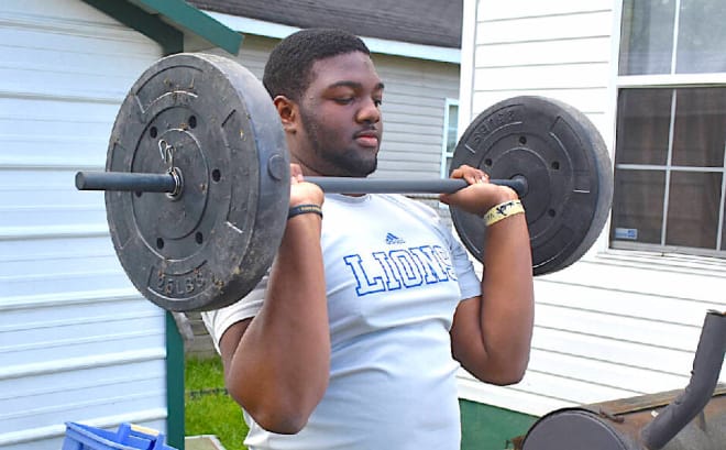 Chattanooga rising senior B.J. Ragland, pictured working out at home, discusses his new offer from ECU.