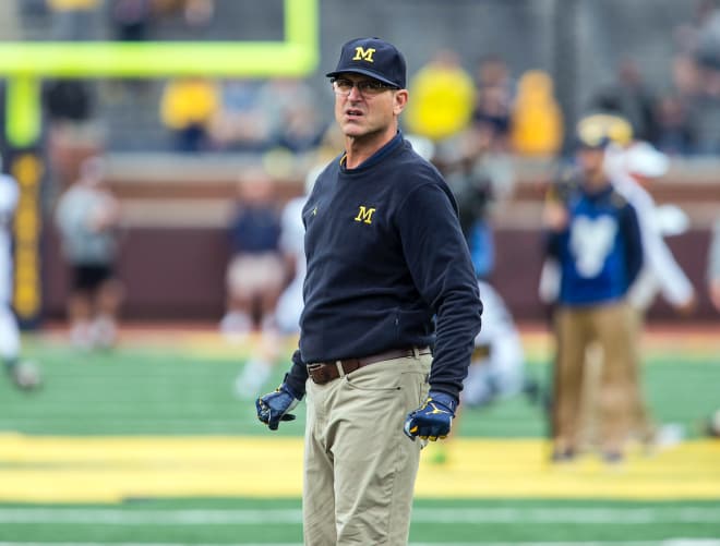 Michigan and Jim Harbaugh are favored by  four to five points against Iowa this weekend.
