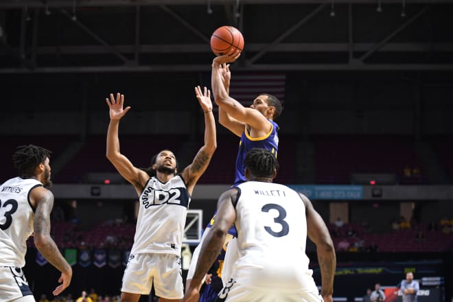 Jamel Morris attempts a layup against D2 on Monday.