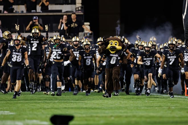 Buffs run out of the tunnel at Folsom field on their first game of the 2022 season on Sept. 2