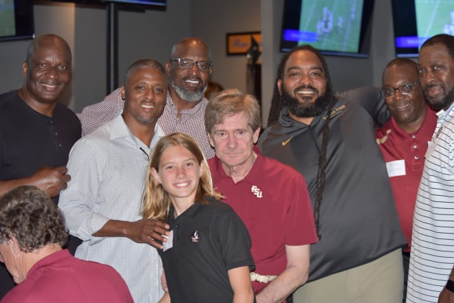 A group of FSU's running backs returned to support Billy Sexton (here with grandson Quinn).