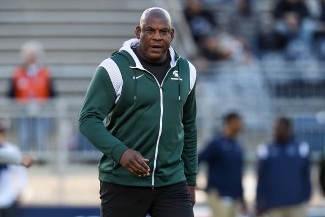 Mel Tucker walks on the field before his team's game against Penn State on Nov. 26, 2022.