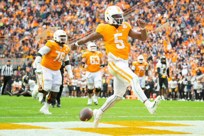 Tennessee quarterback Hendon Hooker celebrates after rushing for a touchdown against Missouri during the 2022 season.