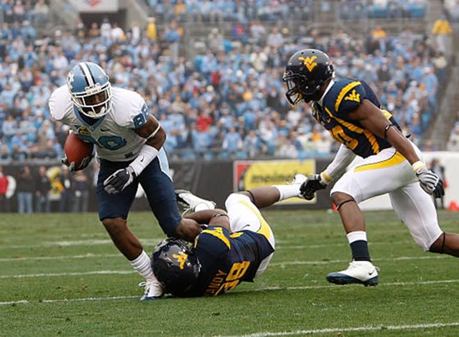 UNC and West Virginia have met just twice on the football field, splitting a pair of bowl games.