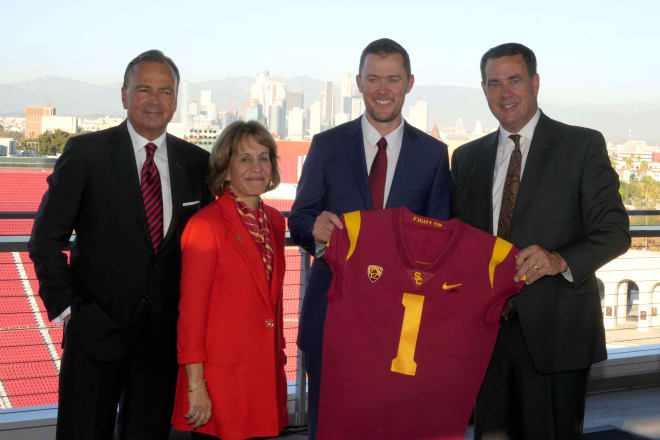 Lincoln Riley, middle, joined by USC Chairman of the Board of Trustees Rick Caruso, USC President Carol Folt and athletic director Mike Bohn at his introductory press conference inside the Coliseum.