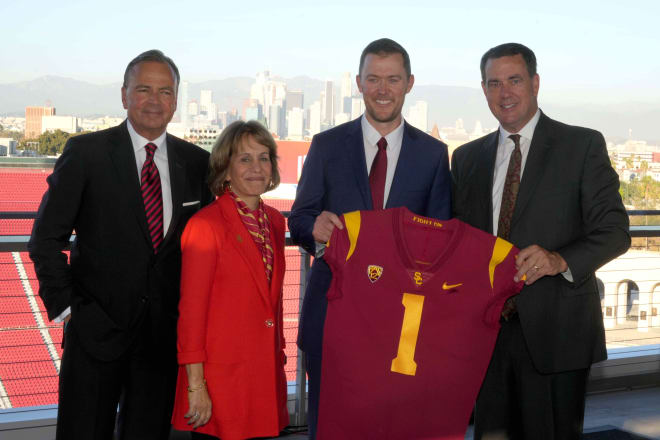 From left, Rick Caruso, Chairman of the USC Board of Trustees, USC President Carol Folt, Lincoln Riley and athletic director Mike Bohn.