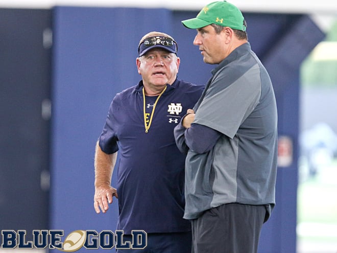 Notre Dame Fighting Irish football head coach Brian Kelly and defensive line coach Mike Elston