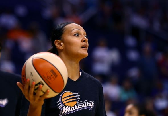 Mistie Bass warms up before her Phoenix Mercury take on the Chicago Sky in game one of the 2014 WNBA Finals. The Mercuy won 83-62 en route to a championship.
