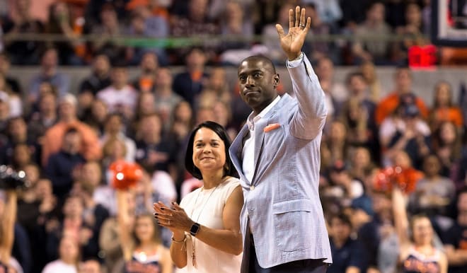 Auburn AD Allen Greene and his wife, Christy, are recognized during Auburn basketball vs. Georgia in 2018.