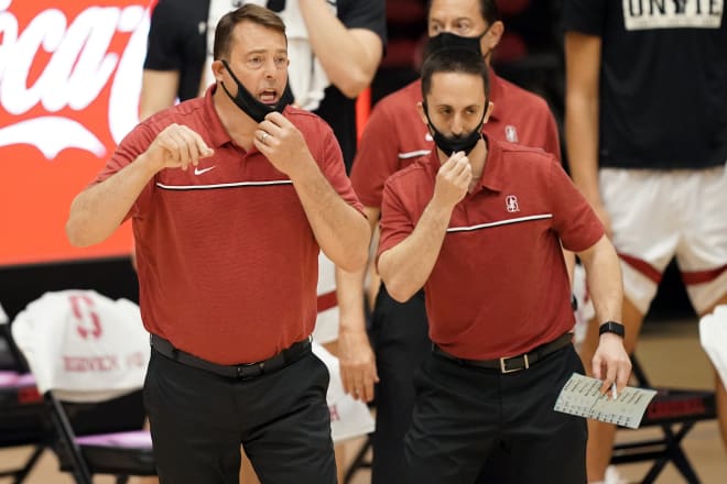 Adam Cohen (right) spent six seasons at Stanford. 