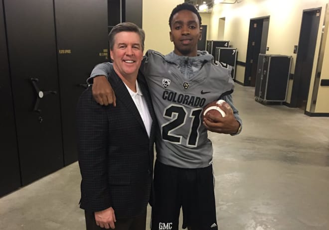 Kevin George pictured with Head Colorado Football Coach Mike MacIntyre 