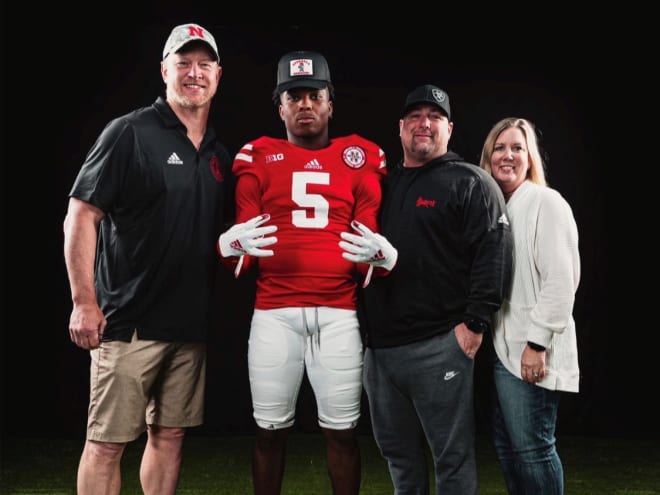 Nebraska official visitor WR Jaidyn Doss with his family and Nebraska head coach Scott Frost