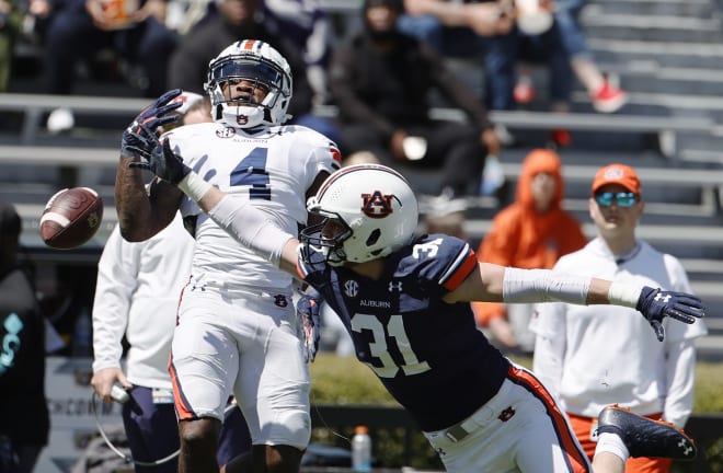 Auburn Tigers linebacker Powell Gordon (31) breaks up a pass intended for running back Tank Bigsby (4) during the Spring game at Jordan-Hare Stadium. Photo | John Reed-USA TODAY Sports