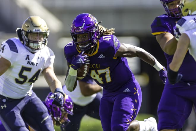 ECU's Rahjai Harris ran for 172 yards on Saturday to no avail as Navy upends the Pirates 27-23 in Greenville. 
