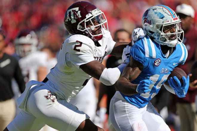 Mississippi Rebels wide receiver Dayton Wade (19) runs after a catch as Texas A&M Aggies defensive back Jacoby Mathews (2) knocks him out of bounds during the first half at Vaught-Hemingway Stadium. Photo |  Petre Thomas-USA TODAY Sports