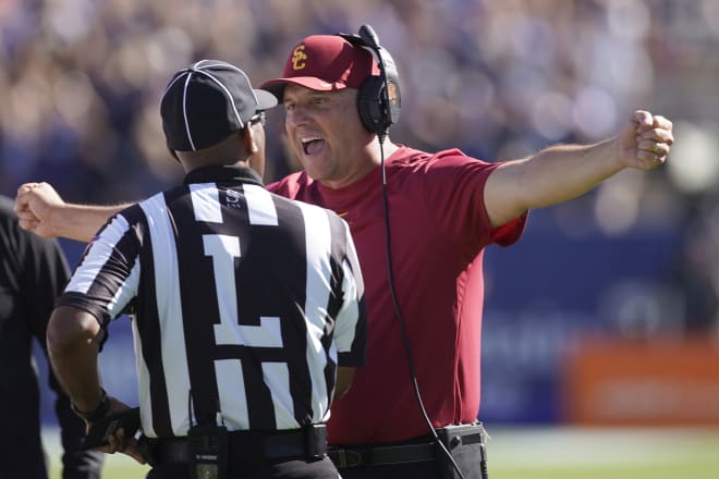 USC head coach Clay Helton has a short week to regroup his team before hosting No. 11 Utah in the Coliseum on Friday night.