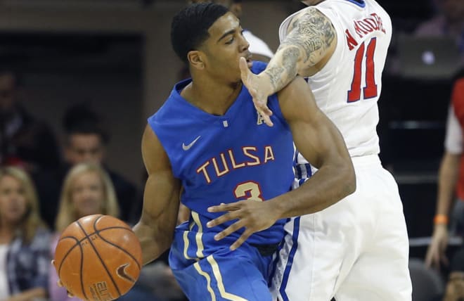 Shaq Harrison led Tulsa with 21 points and 8 assists