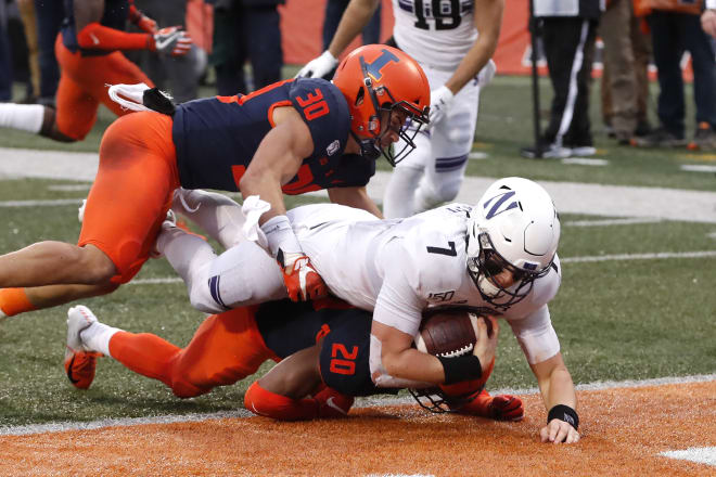 Andrew Marty scores a touchdown against Illinois.