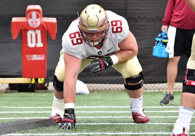 Junior Landon Dickerson is one of four offensive linemen who have gained 12 pounds since last season.