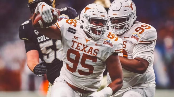 Texas DT Alfred Collins.