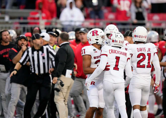 ct 1, 2022; Columbus, Ohio, USA; Ohio State Buckeyes head coach Ryan Day and Rutgers Scarlet Knights head coach Greg Schiano argue after Knights wide receiver Aron Cruickshank (1) hit Ohio State Buckeyes punter Jesse Mirco (29) out of bounds on a fake punt run that resulted in a penalty in the fourth quarter of the NCAA Division I football game between the Buckeyes and the Scarlet Knights at Ohio Stadium. Cruickshank was kicked out of the game for the penalty.