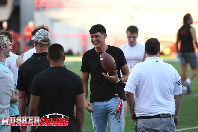 QB Torres talking with Scott Frost and Landon Samson 