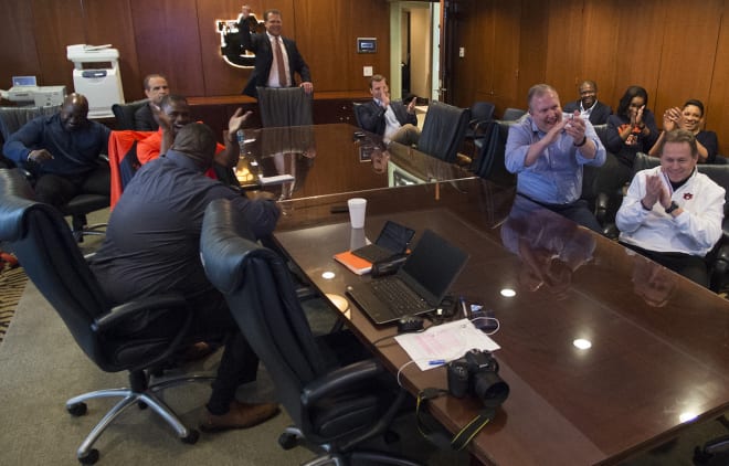 Malzahn and his staff celebrate Auburn's strong Signing Day finish.