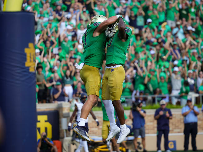 Tight end Michael Mayer, left, celebrates with wide receiver Jayden Thomas after Mayer's touchdown catch in Notre Dame's 24-17 victory over Cal.
