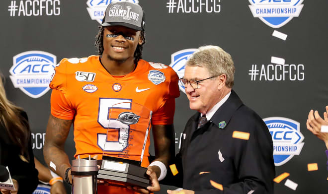 The future first-rounder is shown here in Charlotte (N.C.) earlier this month with ACC Commissioner John Swofford.  Higgins earned MVP honors of the ACC Championship game.