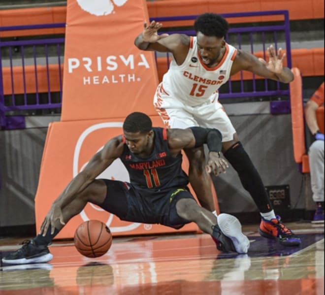 Maryland guard Darryl Morsell (No. 11) slips during the Terps' game at Clemson. 