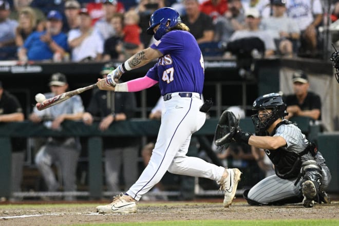 SU third baseman Tommy White (47) hits a two-run walk-off home run in the 11th inning for 2-0 College World Series win over Wake Forest on Thursday night