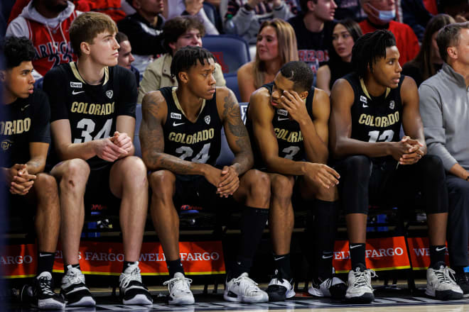 Colorado's bench reacts to a second half run by the Wildcats during Thursday's loss at No. 6 Arizona 