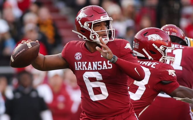 Former Arkansas QB Jacolby Criswell attempts a pass against Missouri on Nov. 24. Criswell is set to transfer back to North Carolina.