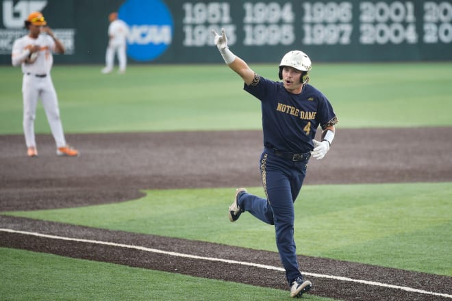 Notre Dame first baseman Carter Putz celebrates a first-inning, two-run homer Friday night in Knoxville, Tenn.