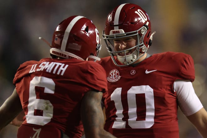 Alabama receiver Devonta Smith (6) and quarterback Mac Jones (10) could both be selected in the top 10 picks of this week's NFL draft. Photo | Getty Images 