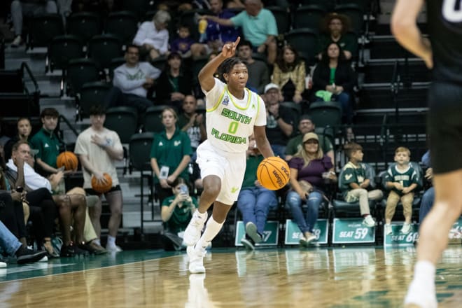 Freshman guard Jayden Reid brings the ball up court for USF