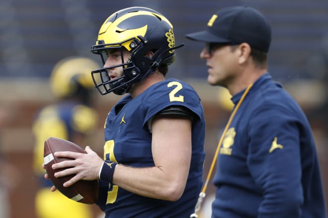 Senior quarterback Shea Patterson and head coach Jim Harbaugh look on in U-M's rout over Rutgers.