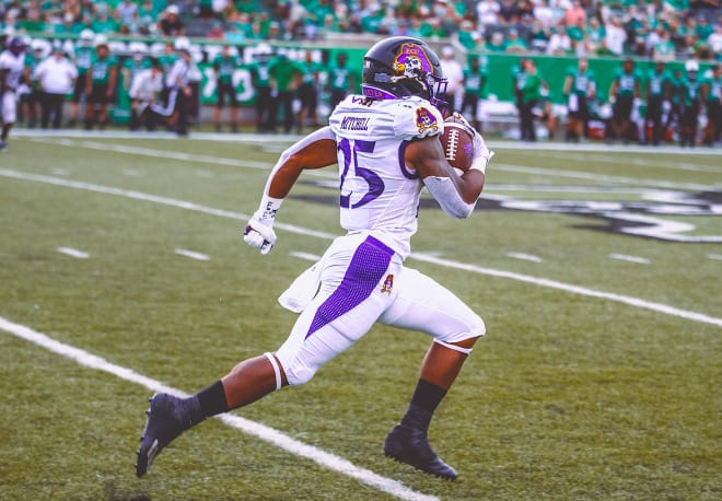 Pirate running back Keaton Mitchell bolts on an 88-yard touchdown run in ECU's 42-38 win over Marshall.