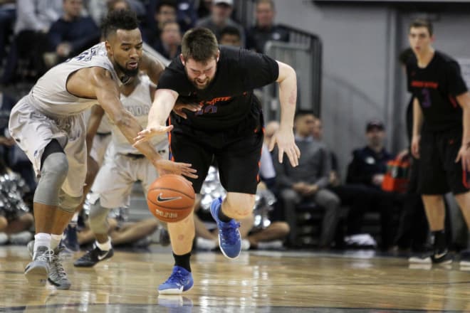 Feb 22, 2017; Reno, NV, USA; Nevada Wolf Pack guard D.J. Fenner (left) takes the ball away from Boise State Broncos forward Nick Duncan (right) in the first half at Lawlor Events Center.