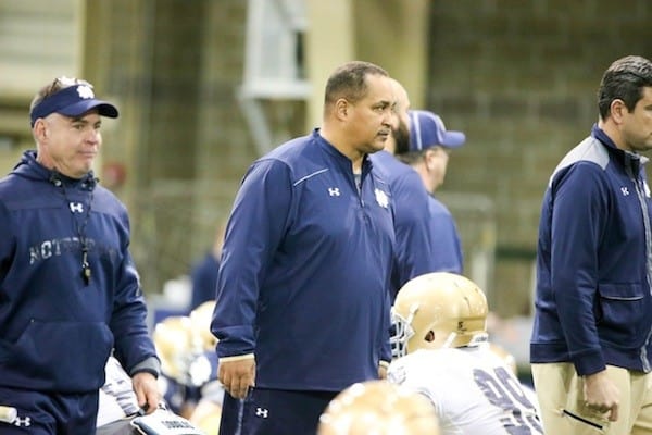 Keith Gilmore (center) was hired as Notre Dame’s defensive line coach in the winter of 2015.