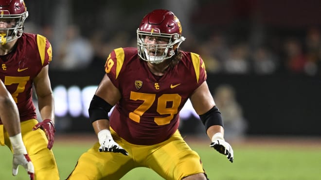 Jonah Monheim started at left tackle last season for USC and will move to center for his final year.