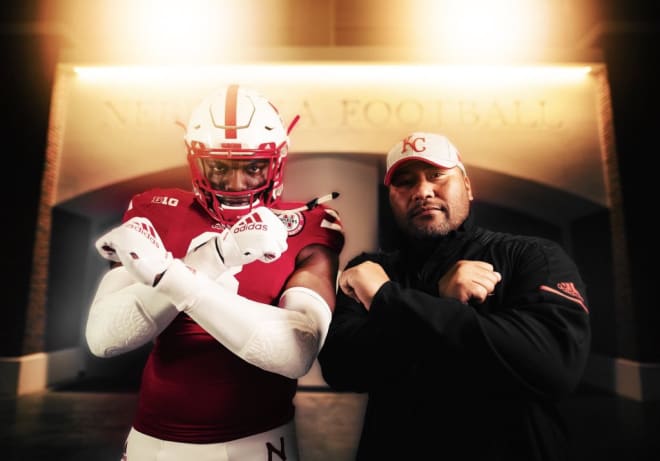 Perrion Winfrey and Husker defensive line coach Tony Tuioti.