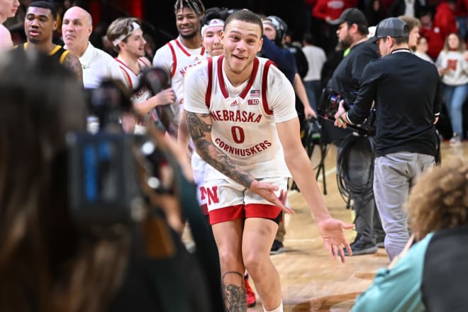 CJ Wilcher celebrates a win over Iowa