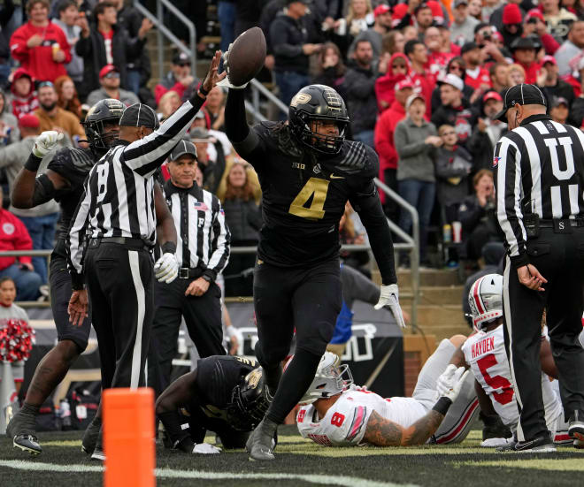 Oct. 14, 2023; Lafayette, In., USA; Purdue Boilermakers linebacker Kydran Jenkins (4) picks up a fumble by Ohio State Buckeyes quarterback Devin Brown (33) in the end zone during the first half of Saturday's NCAA Division I football game at Ross-Ade Stadium in Lafayette.