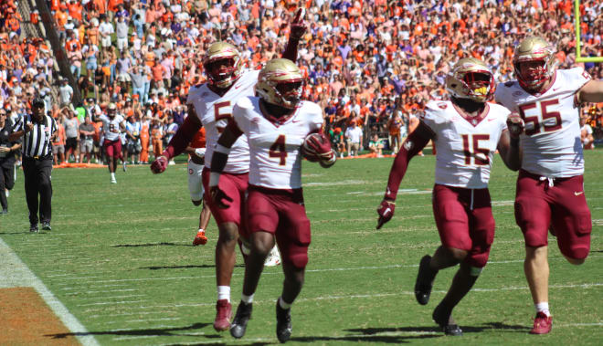 FSU players celebrated on their way to the end zone alongside Kalen DeLoach.