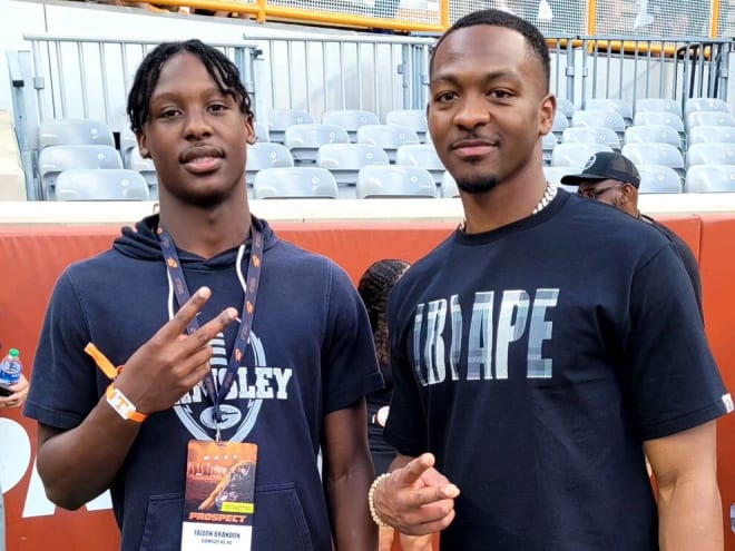 2026 Grimsley (N.C.) quarterback Faizon Brandon with Hendon Hooker (Brandon)