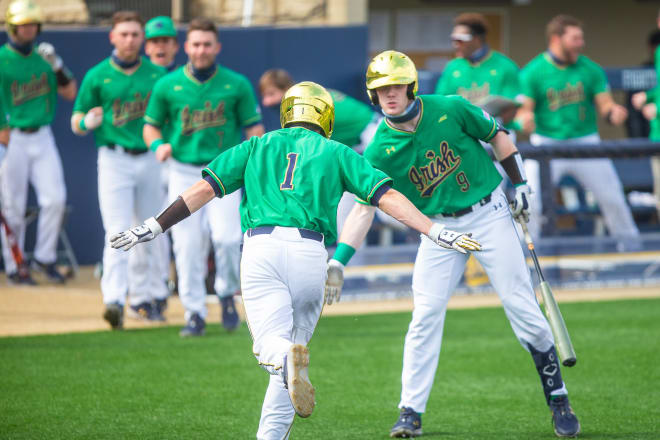 Notre Dame Fighting Irish baseball left fielder Ryan Cole (No. 1) and third baseman Jack Brannigan (No. 9)