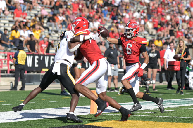 Jeshaun Jones (No. 6) scores a first-quarter touchdown in the Terps' season-opening win over Towson. 
