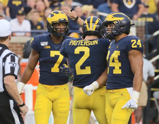 Michigan Wolverines football redshirt sophomore wide receiver Tarik Black (far left) hauled in just his second career touchdown on Saturday.